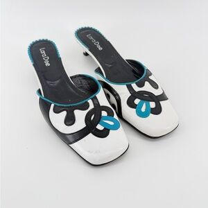 Black and White Mules with Blue Accents